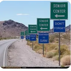 A row of "Senior center" signs: "Don't forget", "Wake up!", "Remember to turn!"