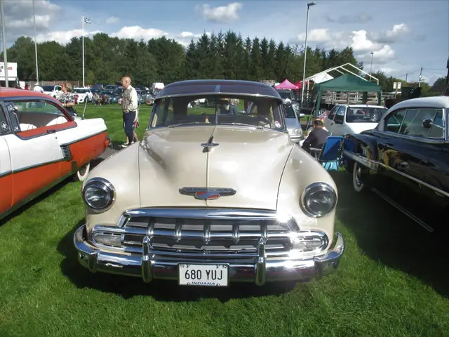 A cream 1950s Chevrolet from the front