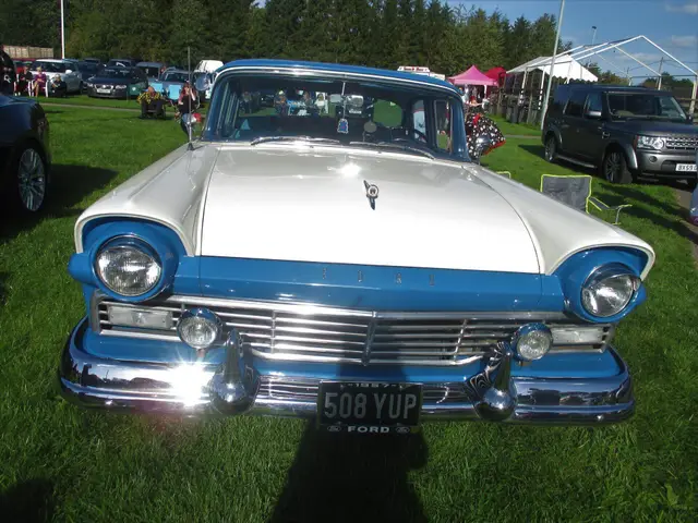The blue and white Ford from the front